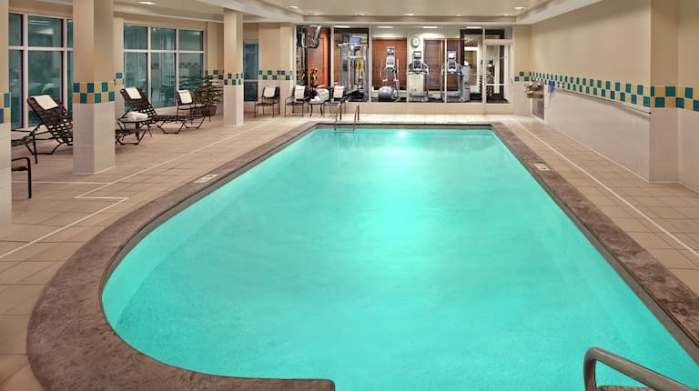 Indoor Pool With Lounge Seating