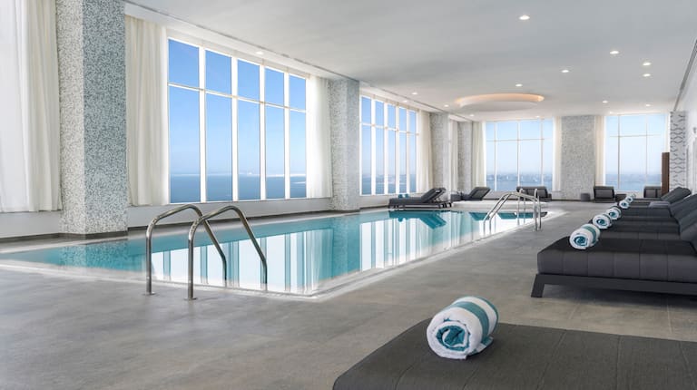 Indoor Pool with Large Windows and Sea View