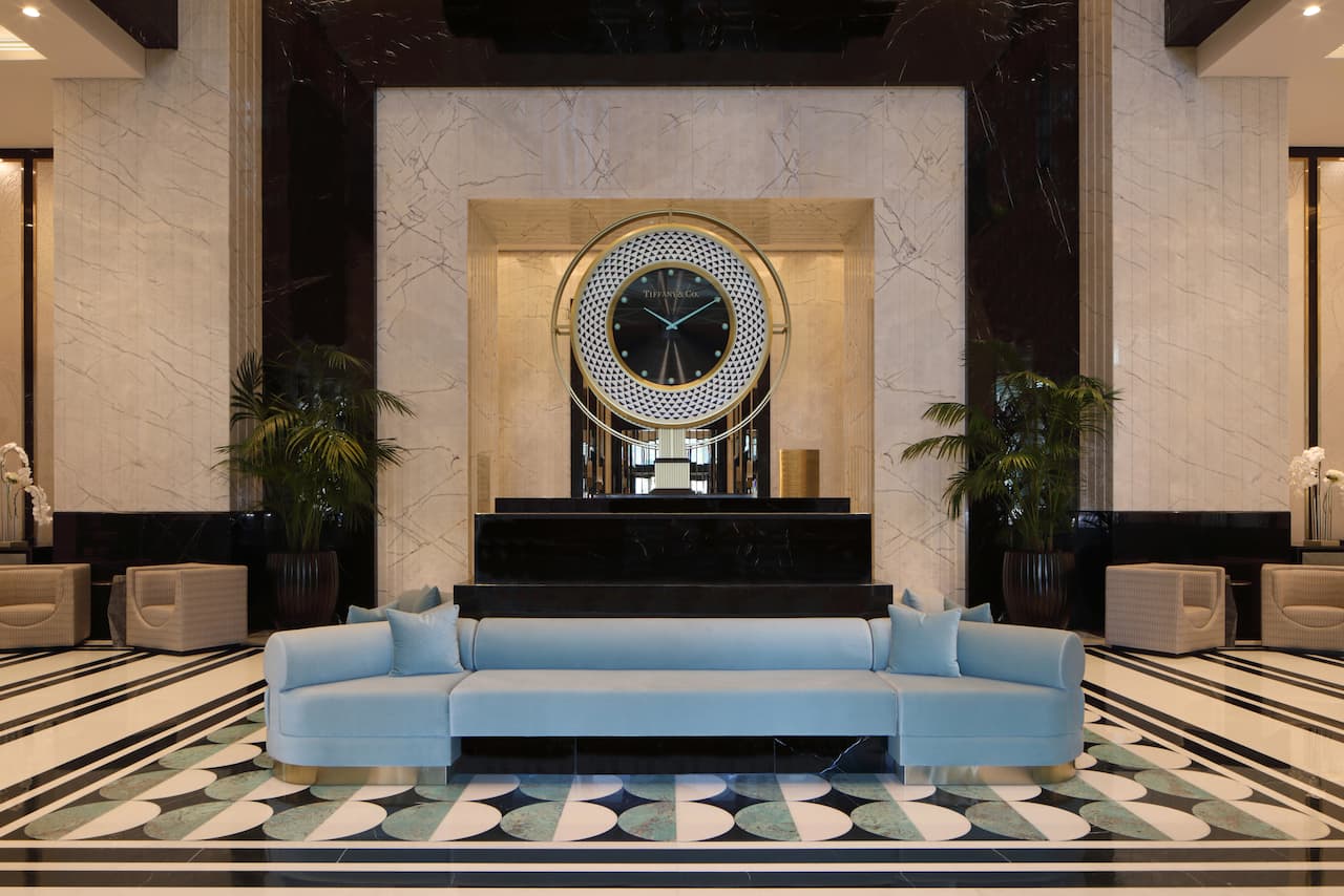 Sitting Area in Lobby with a Large Clock