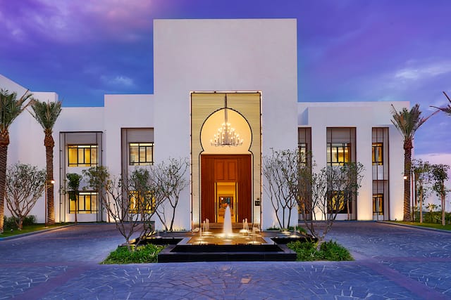 Hotel Exterior with a Fountain