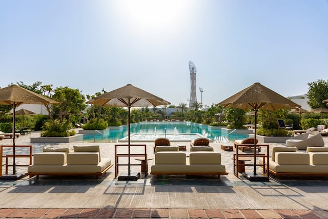 Lounge chairs overlooking outdoor pool