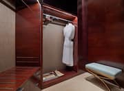 Suite closet with clothes hangers