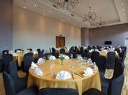Spacious Ballroom Area with Dining Round Tables and Chairs
