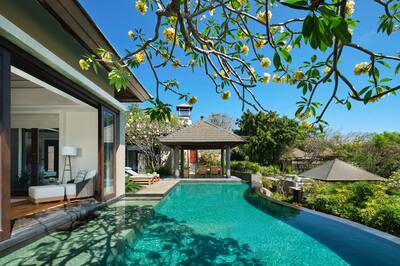 Outdoor Pool Area of a Villa with Tropical Garden
