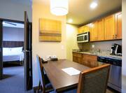 Suite Kitchen with microwave and dining table