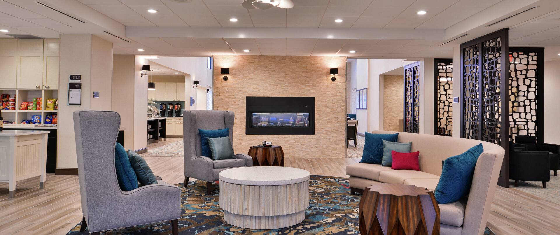 Lounge Seating in Front of Fireplace in Lobby
