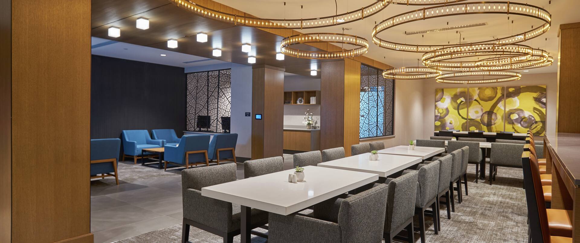 Hilton Hotel Executive Lounge with Tables and Chairs