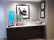 Breakfast serving area with cereal selections and dining amenities