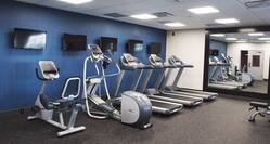 Fitness Center with exercise bike, elliptical, and treadmills