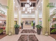 Hotel Lobby with Columns and Plants