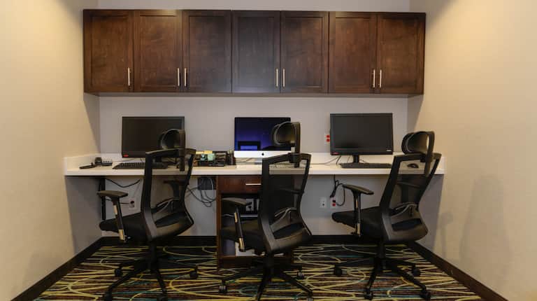 Business Center Desktop Computers on Counter with Office Chairs