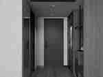 Guestroom Entryway With Storage Cabinetry and Full-Length Mirror