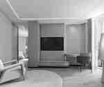 Guestroom Lounge Area With Work Desk and Large Window