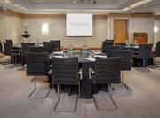 Dodder Suite Meeting Room with Round Tables and Screen