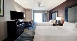 Suite with Double Queen Beds, Work Desk, and Room Technology