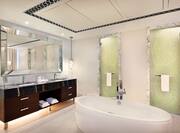Suite Bathroom with Spacious Tub and Vanity