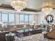 Presidential Suite Lounge Area with Elegant Lighting Fixtures and Modern Decor