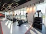 Fitness Center with Treadmills and Large Windows