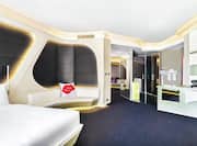 King Deluxe Suite with Bed and Lounge Area