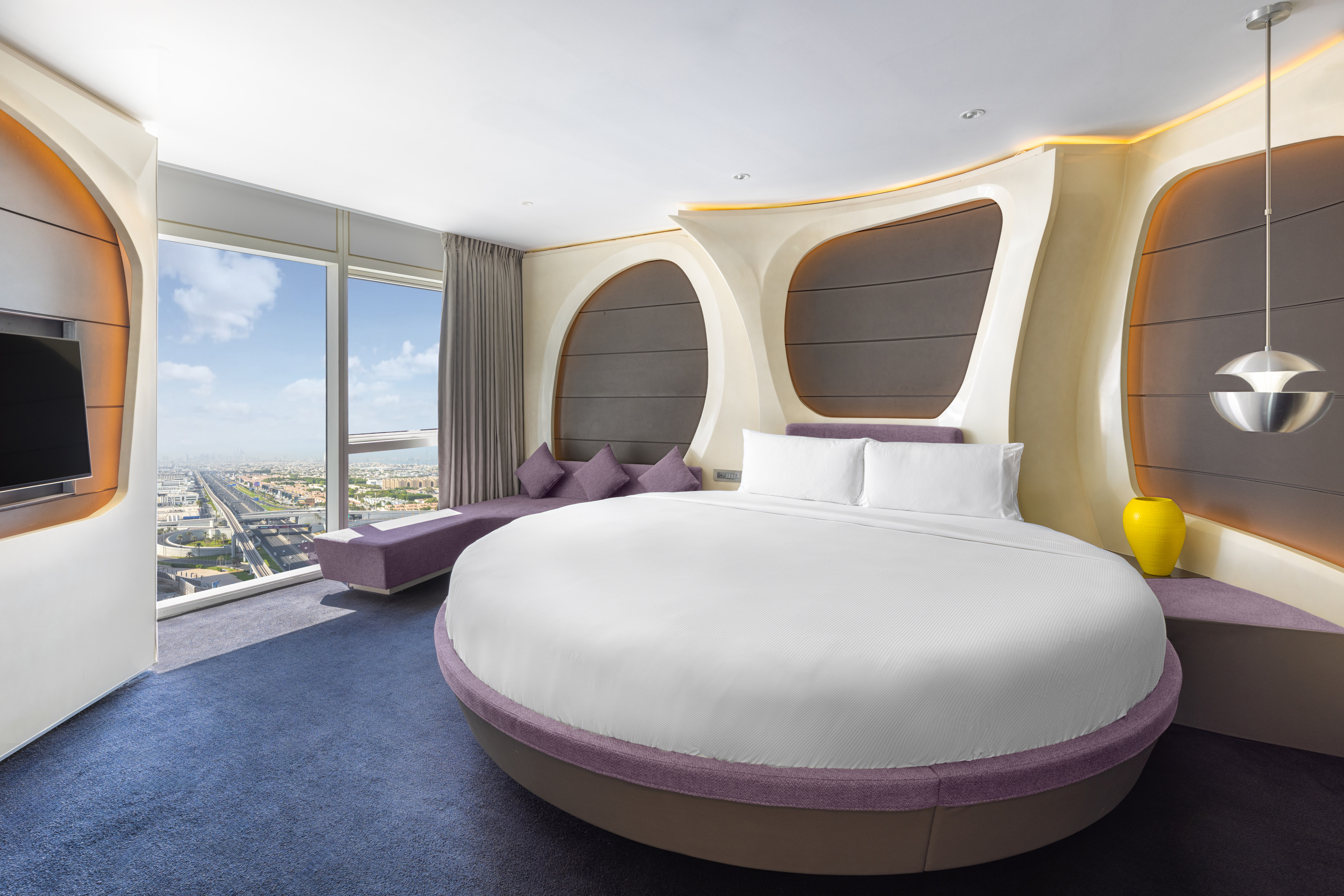 Suite with Round Bed and Outside View