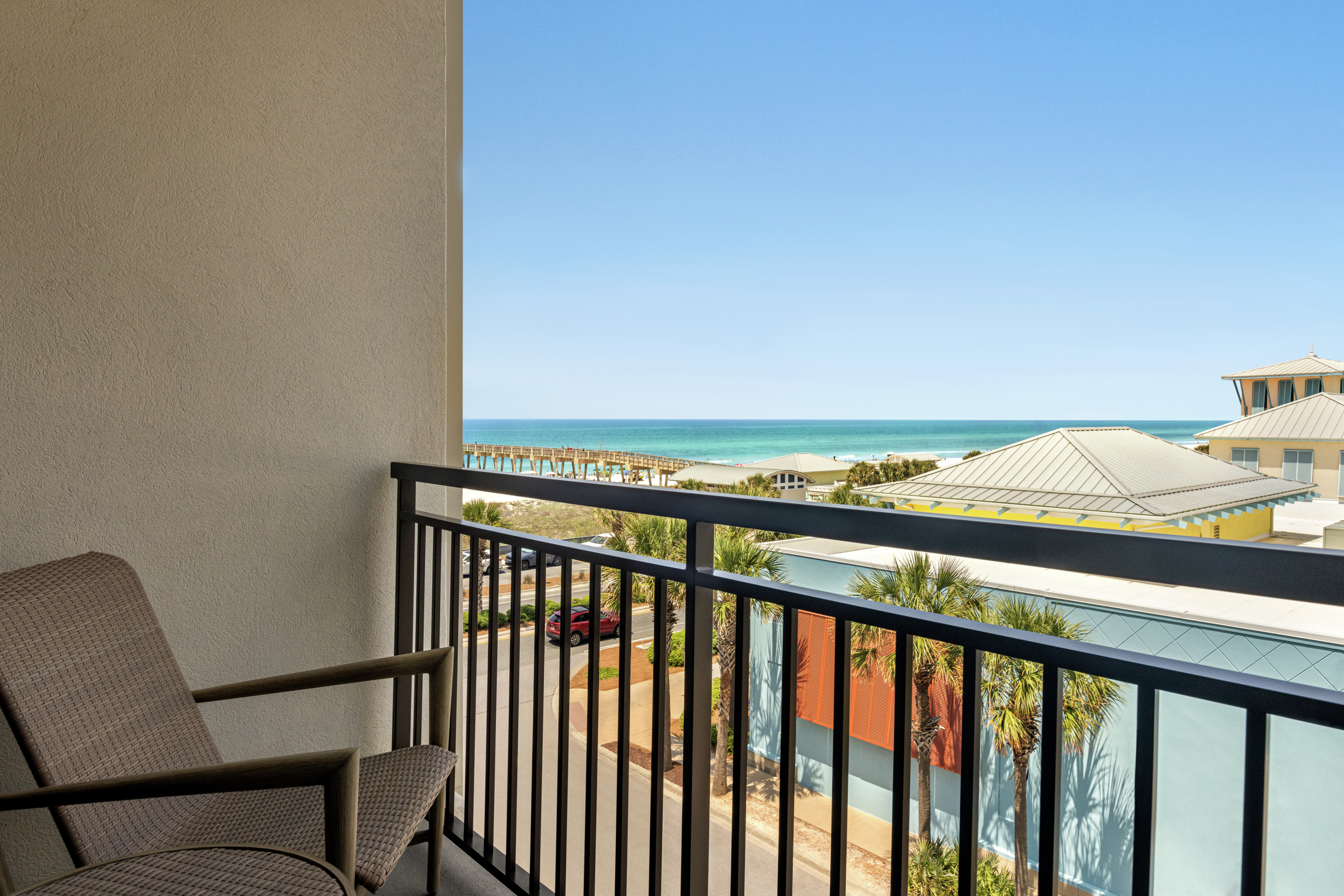 Stunning partial ocean view from guest room patio seating