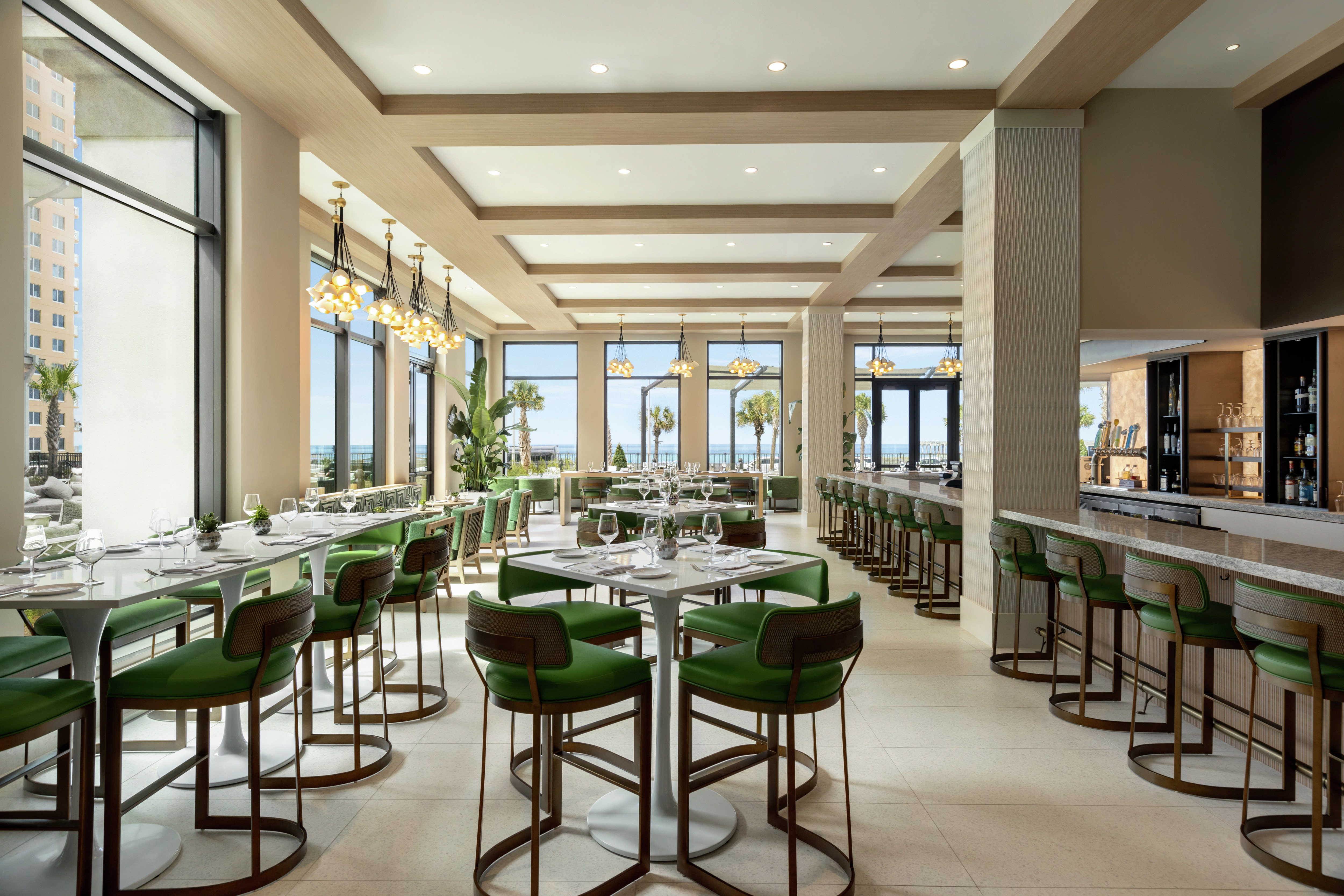 Convenient on-site bar and grill with ample seating and ocean views