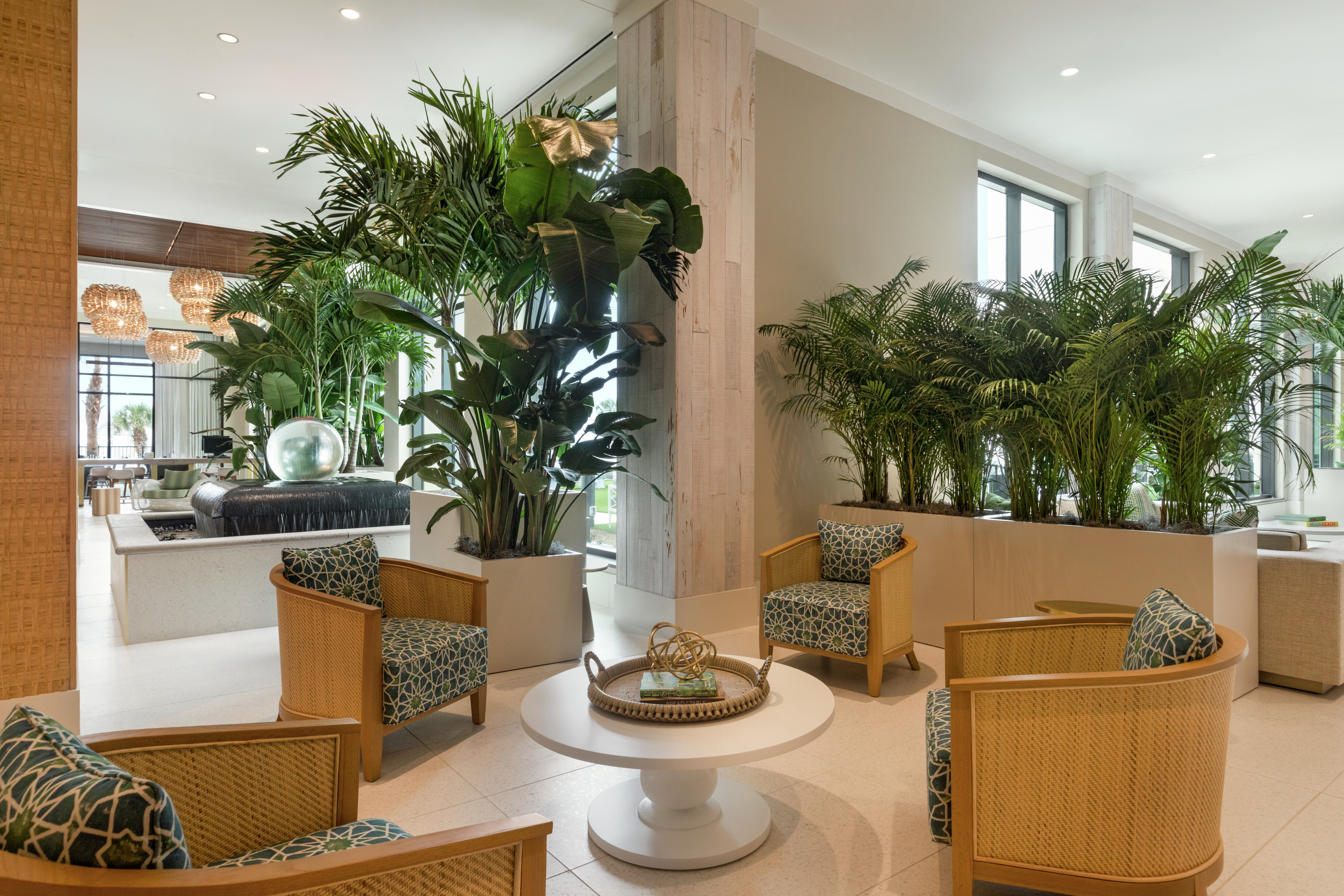 Stylish and spacious lobby featuring indoor water fountain and comfortable resort style seating
