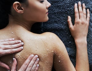 Woman Receiving a Salt Massage