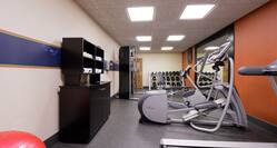 Exercise Ball, Cardio Machines, and Free Weights in Fitness Center