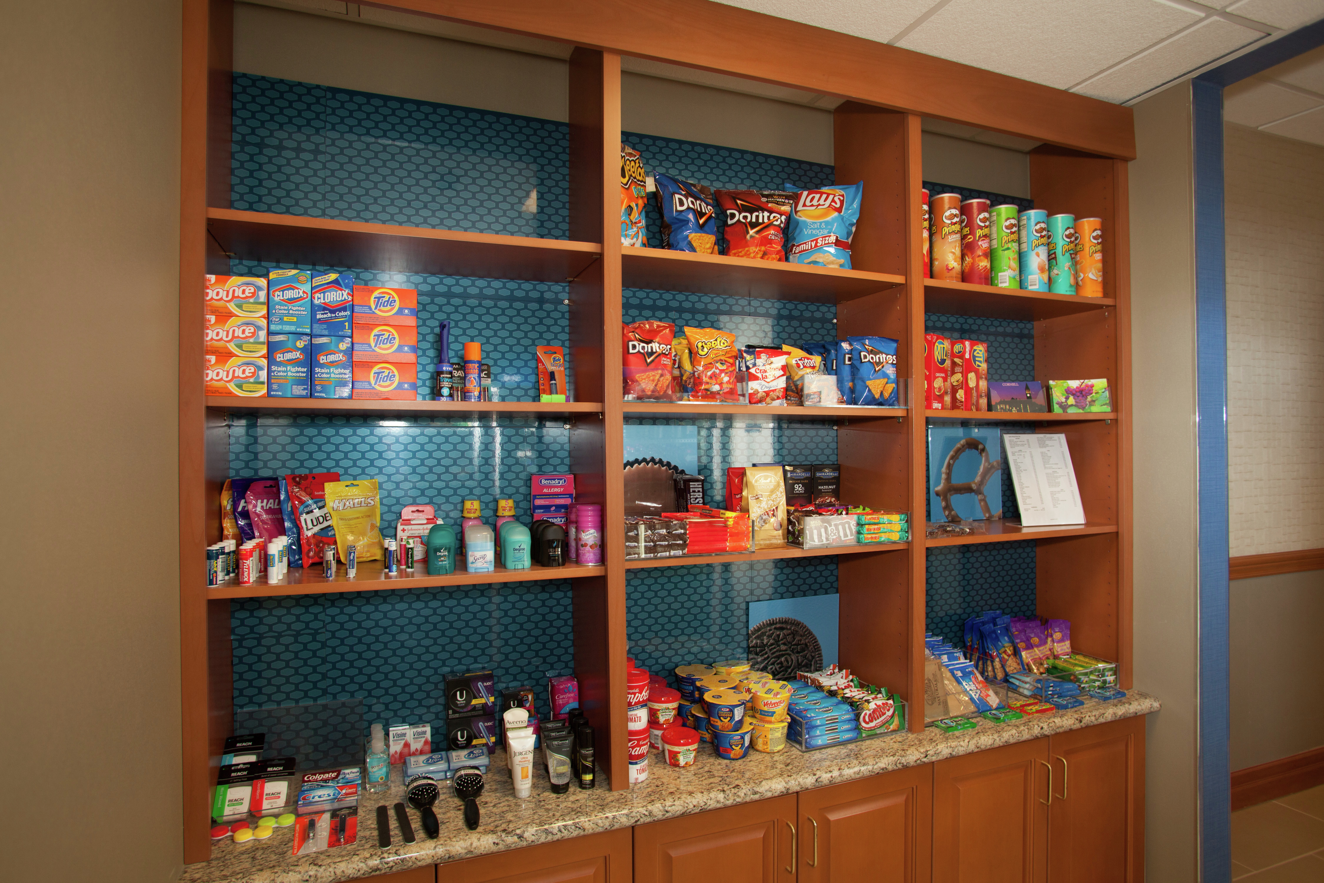 Snacks, Toiletries, and Other Items on Display in 24-Hour Convenience Shop