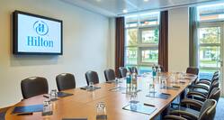 Meeting Room Formal Set Up with Wall Mounted HDTV
