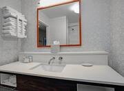 Bathroom Sink and Mirror with Towels