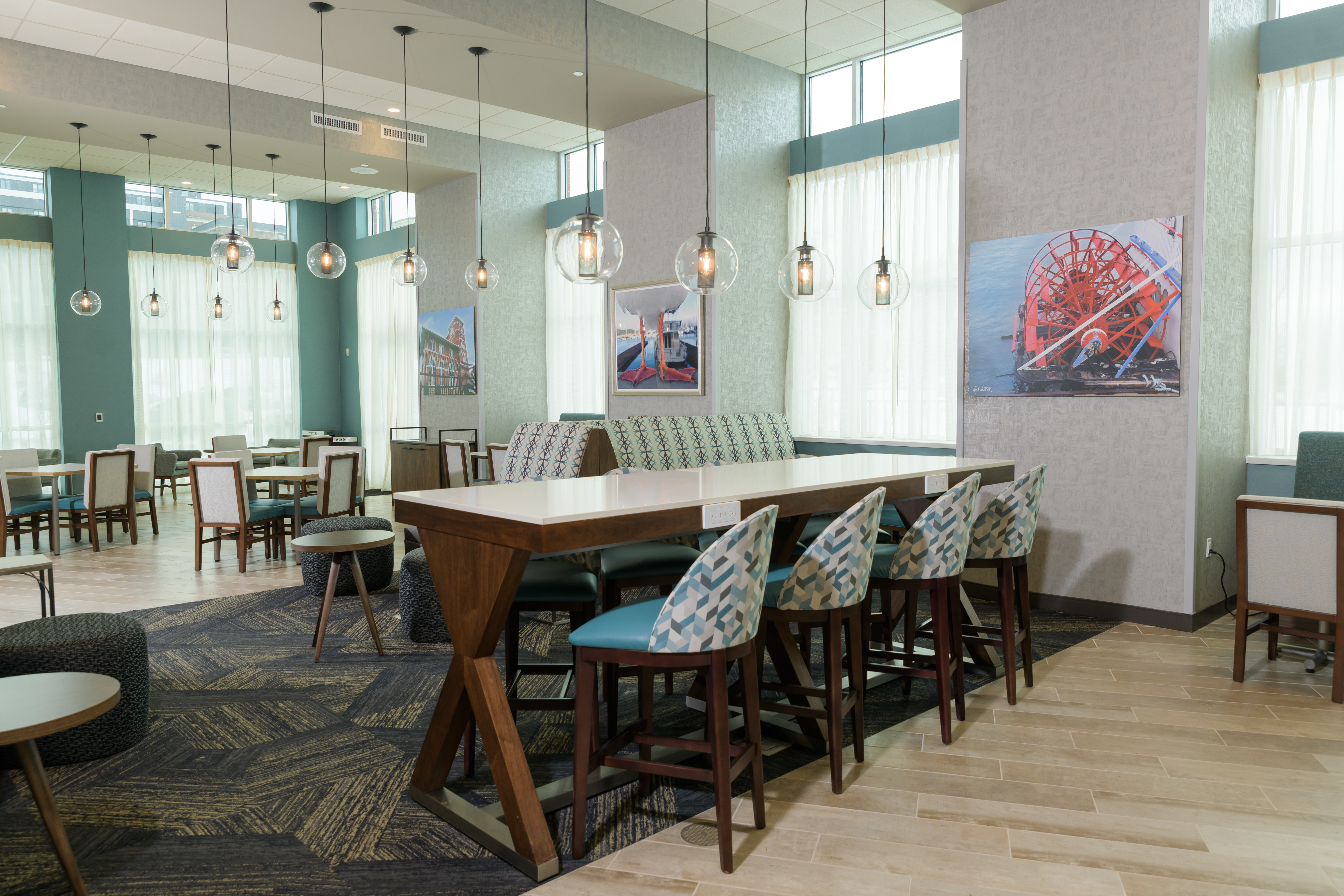 Lobby seating area with table and stools