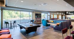 Pool Table and Comfortable Seating Area in Lobby