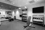 Fitness Center with Weights Exercise Balls and HDTV