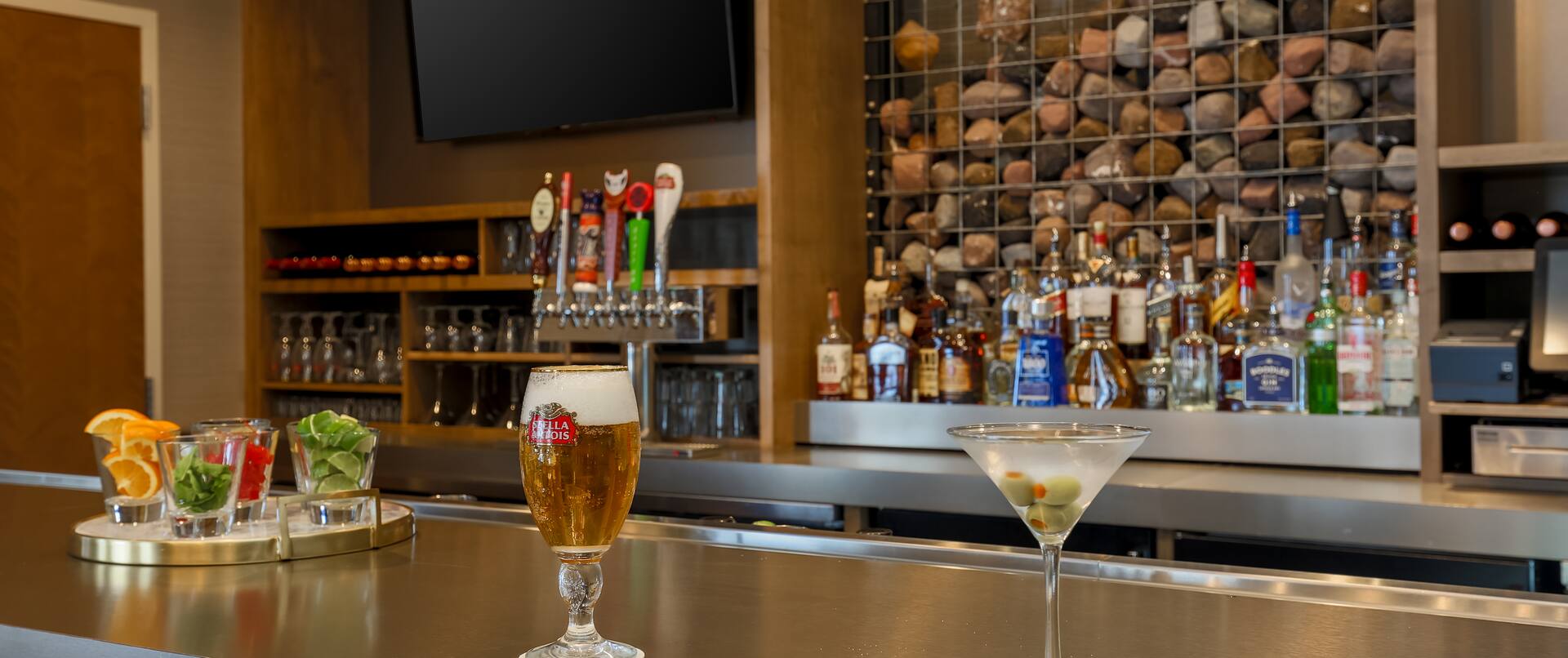 Detailed View of Cocktails on Counter by Fully Stocked Quarry Bar