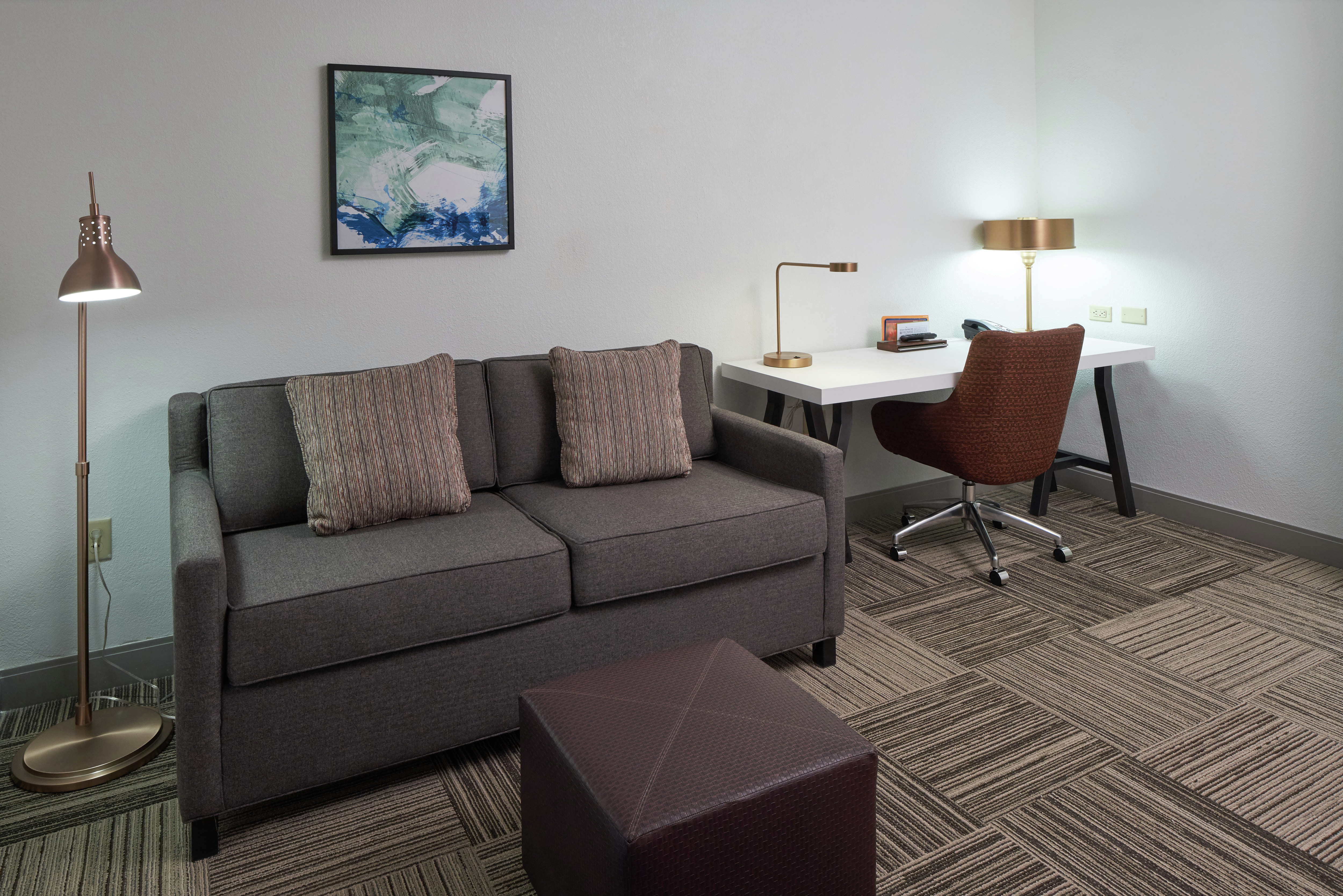 King Jr. Suite Living Room with In-Room Business Center and Sofa