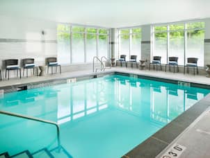 Indoor Pool Area with Seating