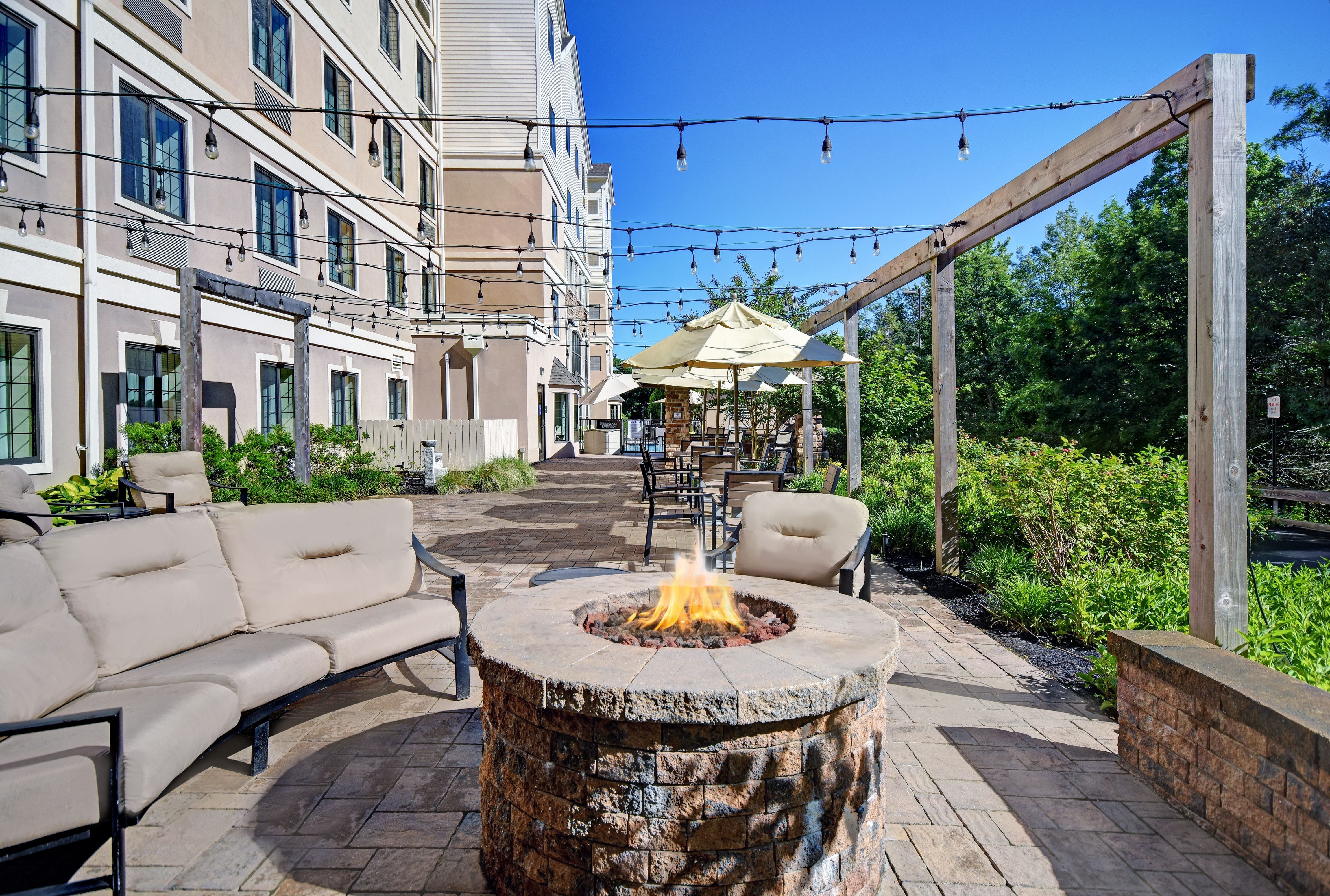 outdoor patio with fire pit in the day