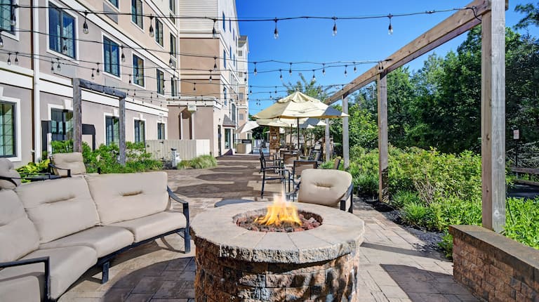 outdoor patio with fire pit in the day