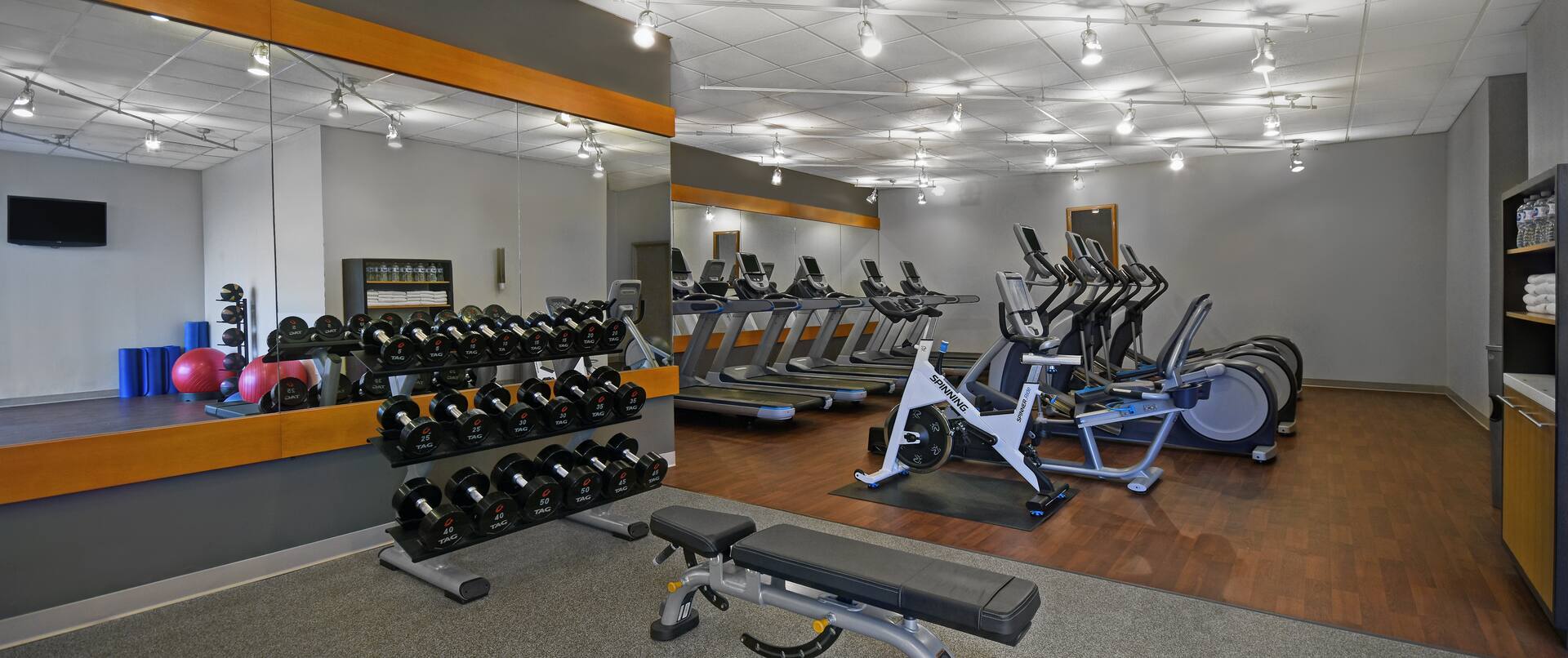 fitness center with weights and exercise machines