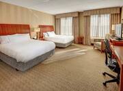 Hearing Accessible Guestroom with Two Queen Beds, Room Technology, Lounge Area, and Work Desk