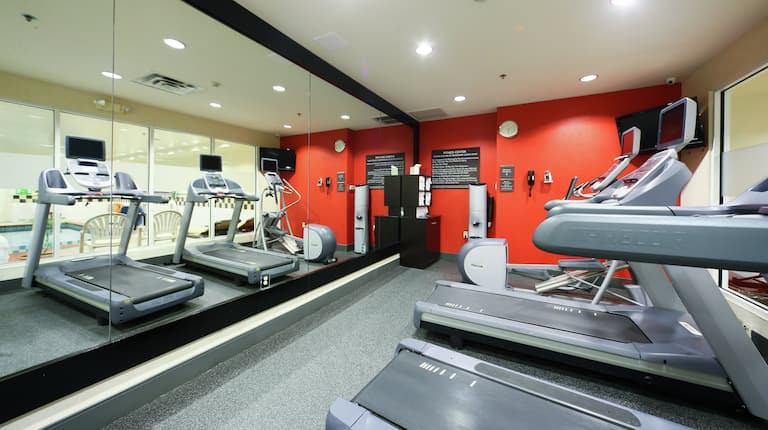Treadmills and Mirror in Fitness Center