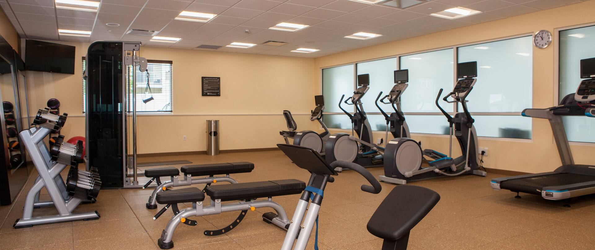 Fitness Center with Free Weights, Benches, and Cardio Equipment
