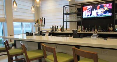 Bar Area with TV and Dining Area