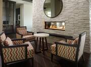 Comfortable Seating Area around Fireplace in Lobby
