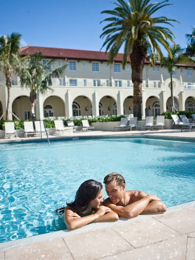 couple relaxing in the outdoor pool