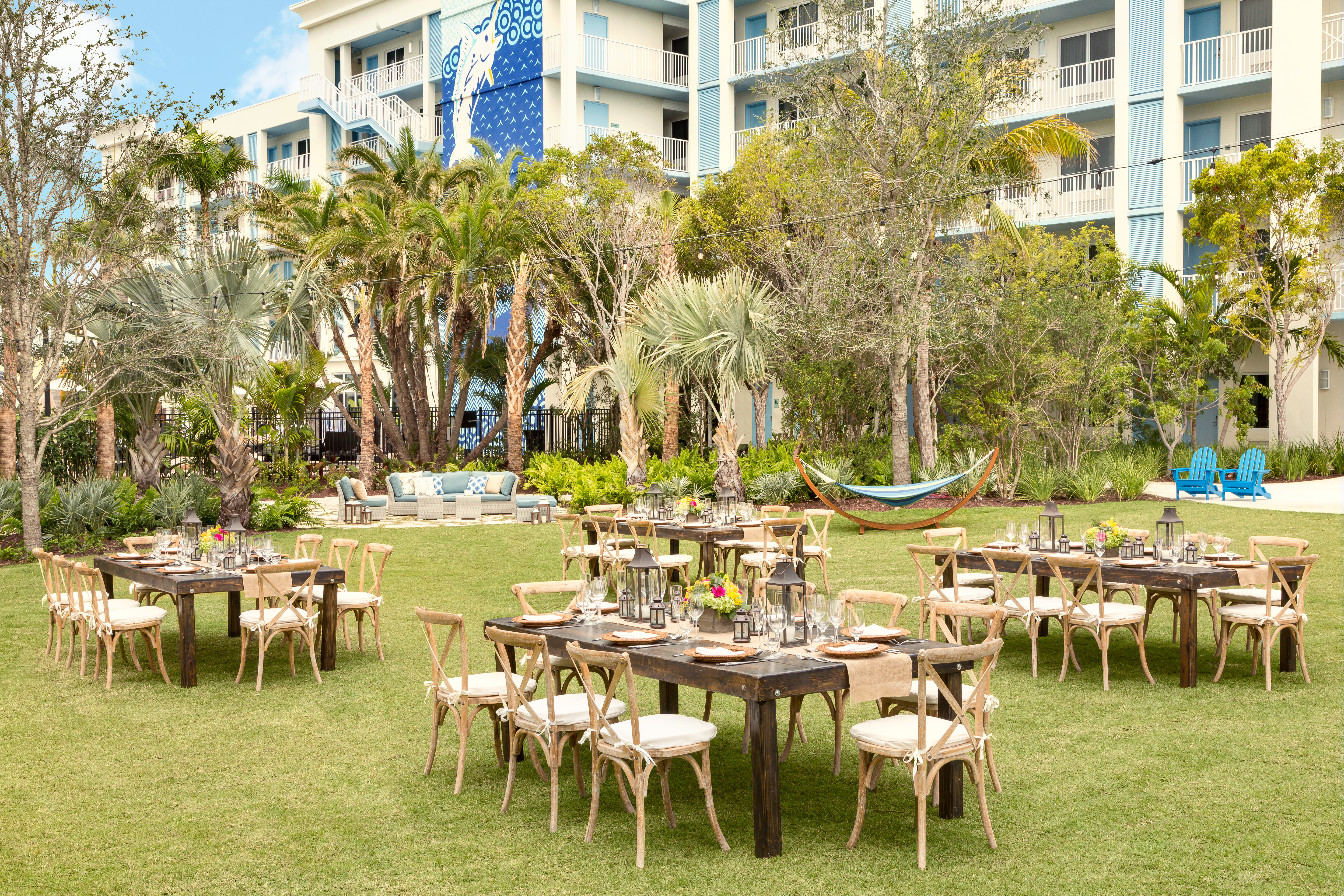Hotel Garden Area with Dining Tables and Chairs at Daytime