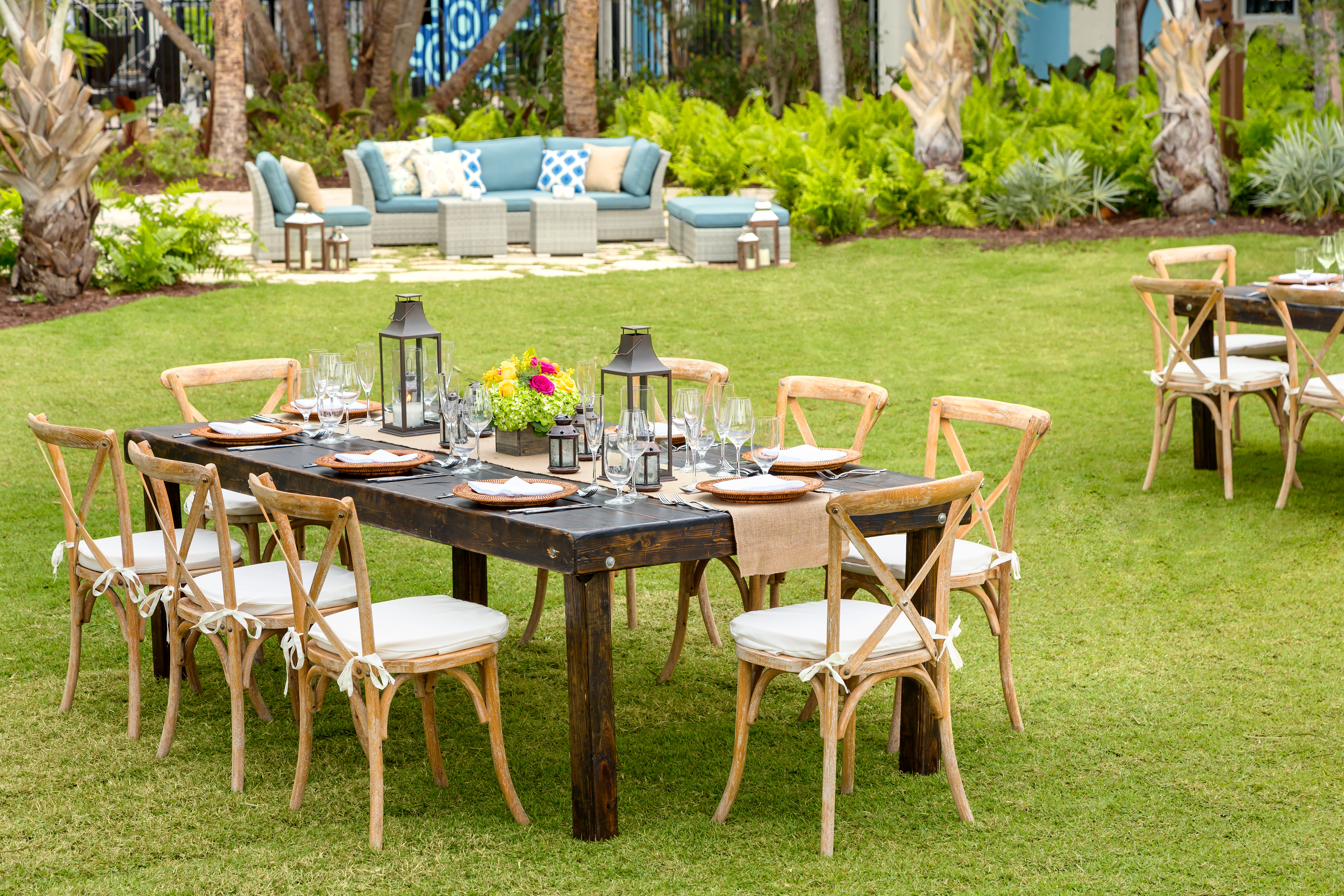 Hotel Garden Area with Dining Tables, Chairs and Sofa