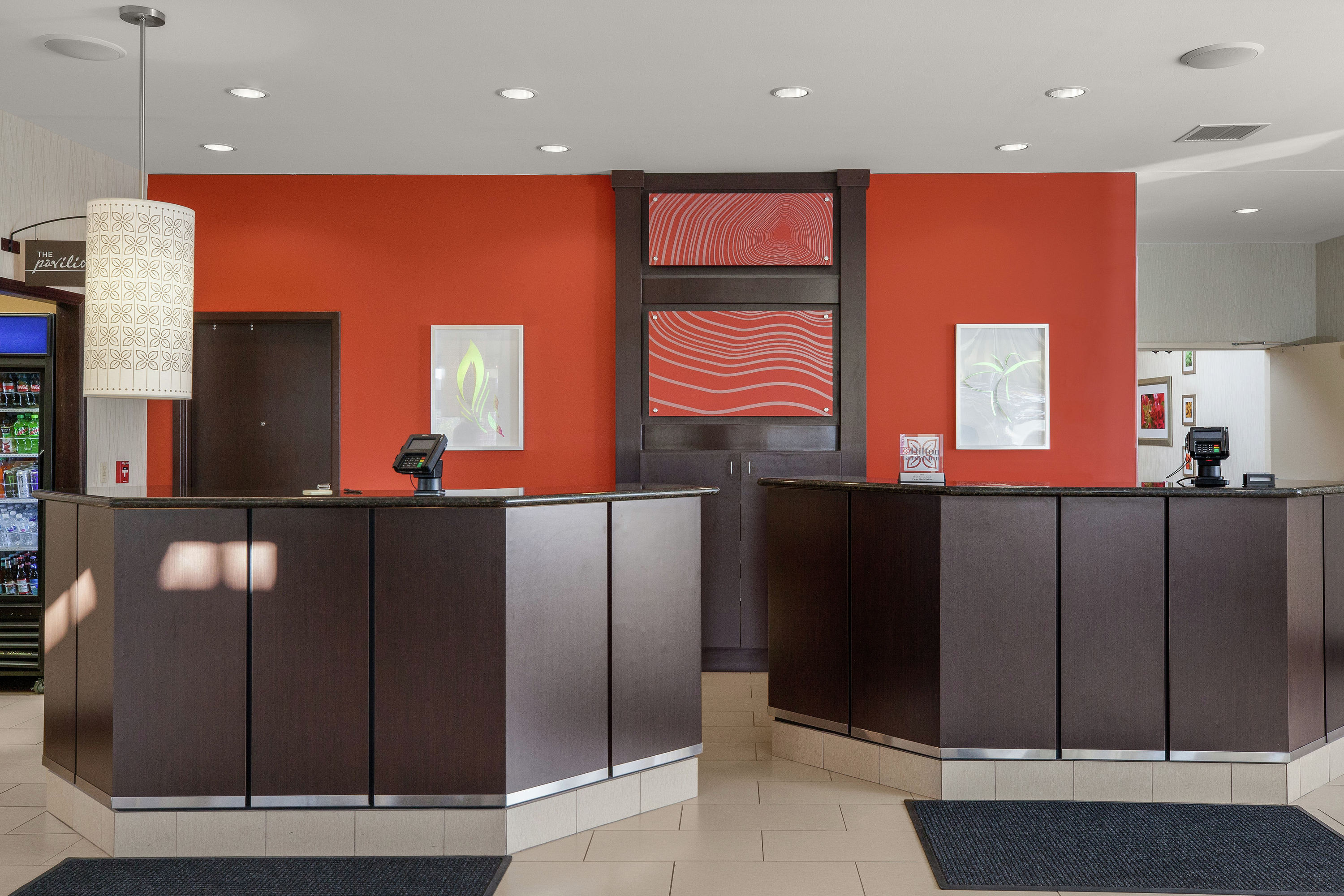 Front Desk with Orange Wall